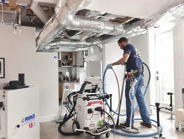 Tyngsborough Air Duct Cleaning technician performing advanced pure duct cleaning with specialized equipment in Tyngsborough