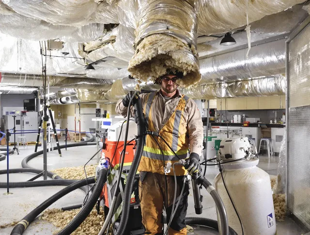 Professional vacuum insulation removal by Tyngsborough Air Duct Cleaning expert in Tyngsborough